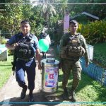 Mga men in uniform lakip mitabang sa gipahigayong Adopt a Barangay project sa HRMO sa Barangay Banglay,Lagonglong, MisOr
